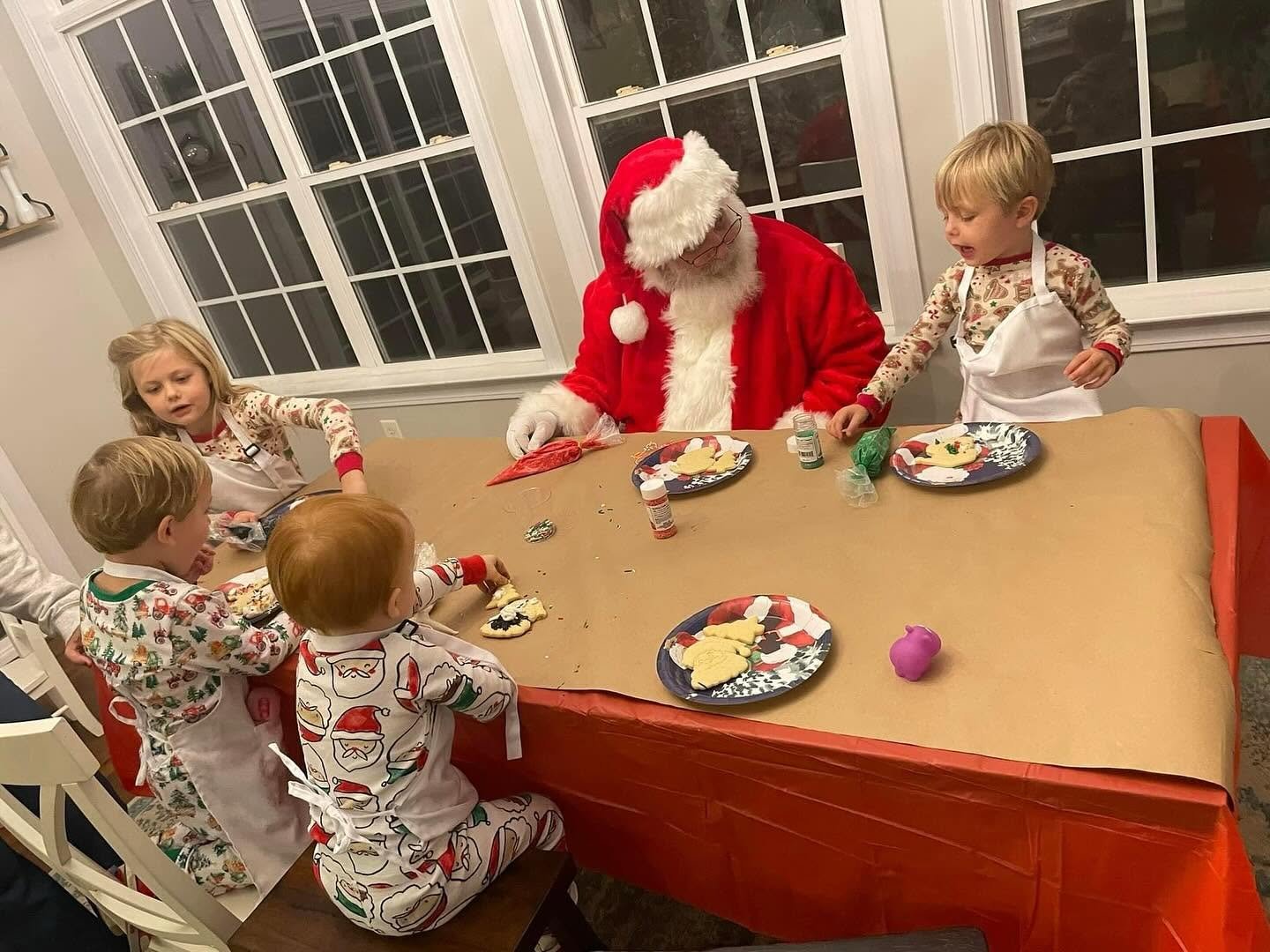 Santa Claus in SC making cookies with kids